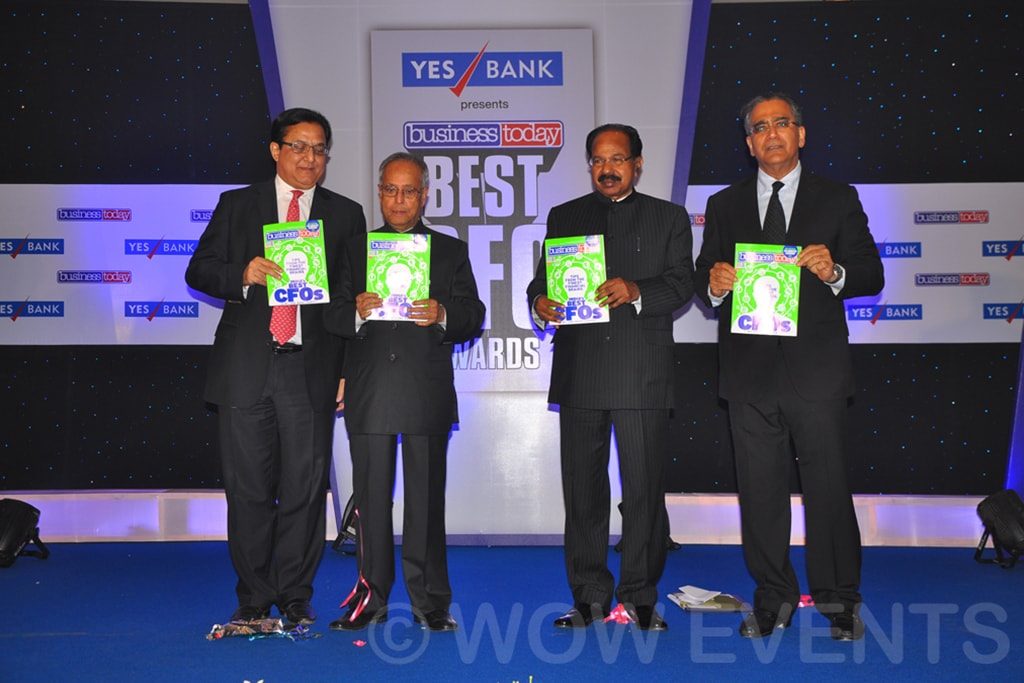 Award winners holding trophies at the Best CFO Awards 2012