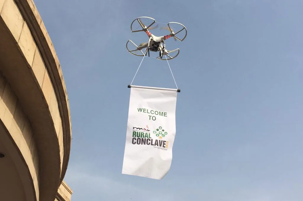 digital-marketing Drone carrying a welcome banner at an outdoor event
