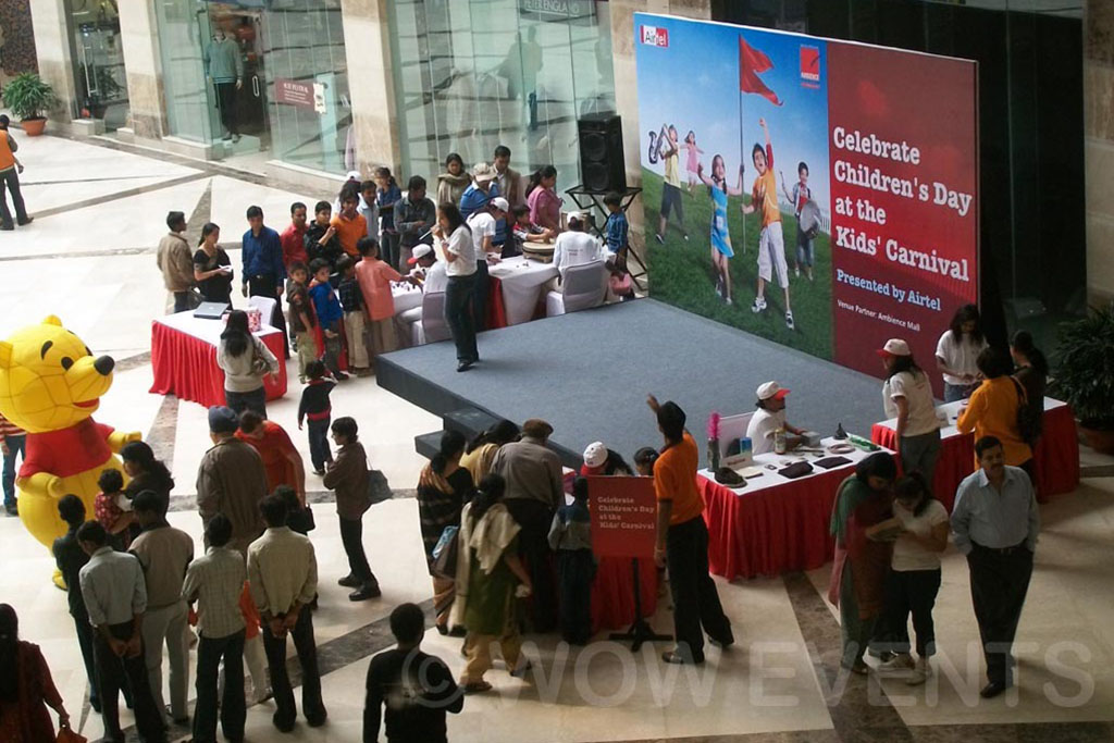 Families gathered at the Children's Day carnival stage
