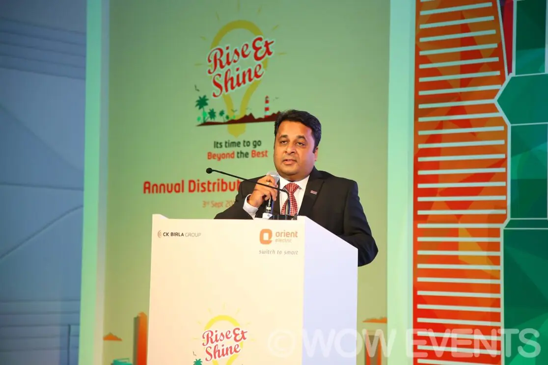 Orient executive at the Rise and Shine podium