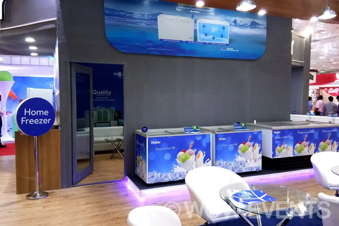 Haier appliances displayed under blue lighting