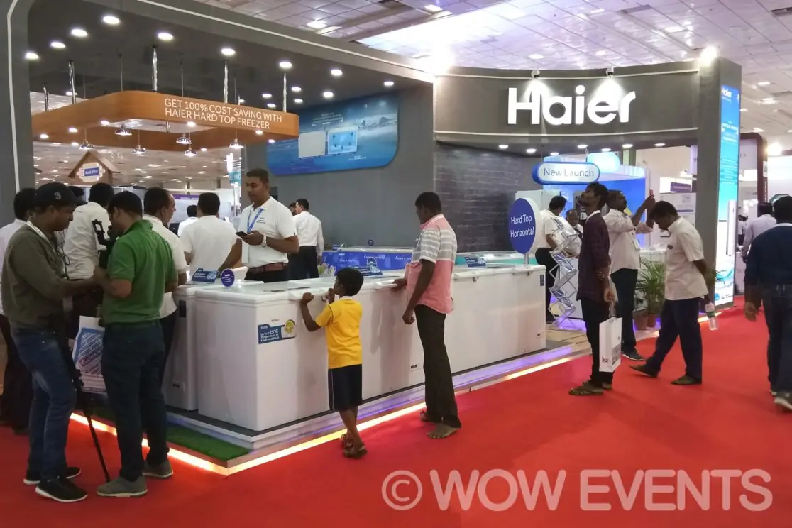 Visitors walking through the Haier experience zone