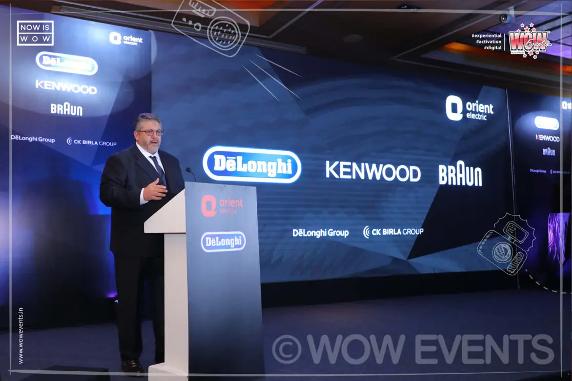 Speaker at the De'Longhi podium on the Kenwood Braun stage