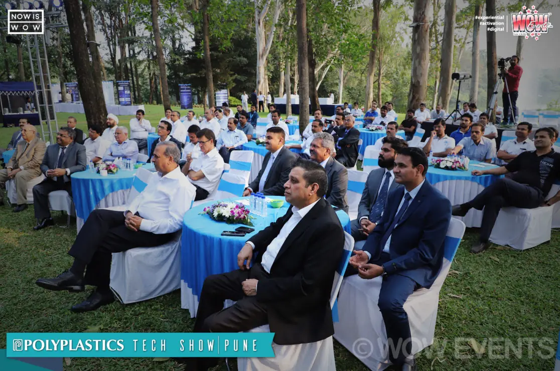 Guests seated outdoors at the Polyplastics tech show