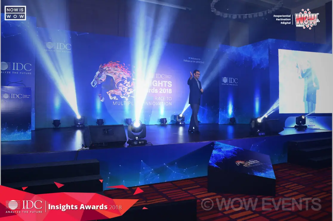 IDC Insights Awards stage lit with blue beams