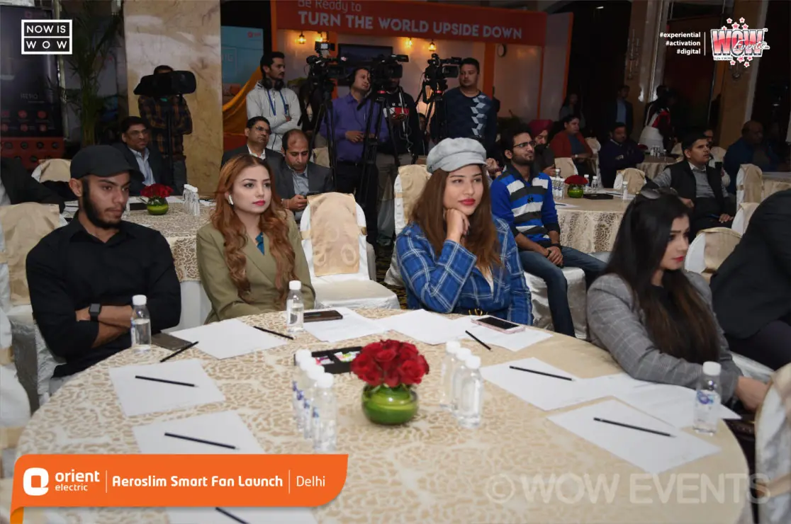 Guests seated at tables at the Orient Aeroslim launch
