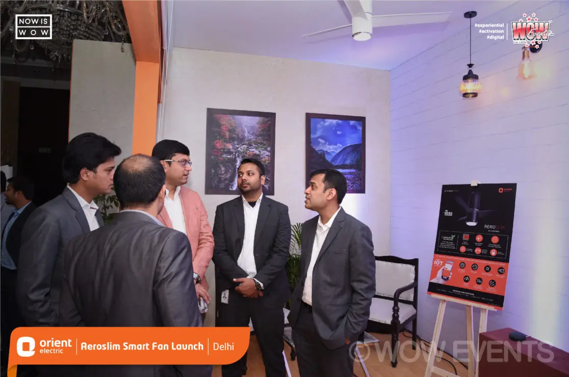Guests viewing a product display at the Orient Aeroslim launch