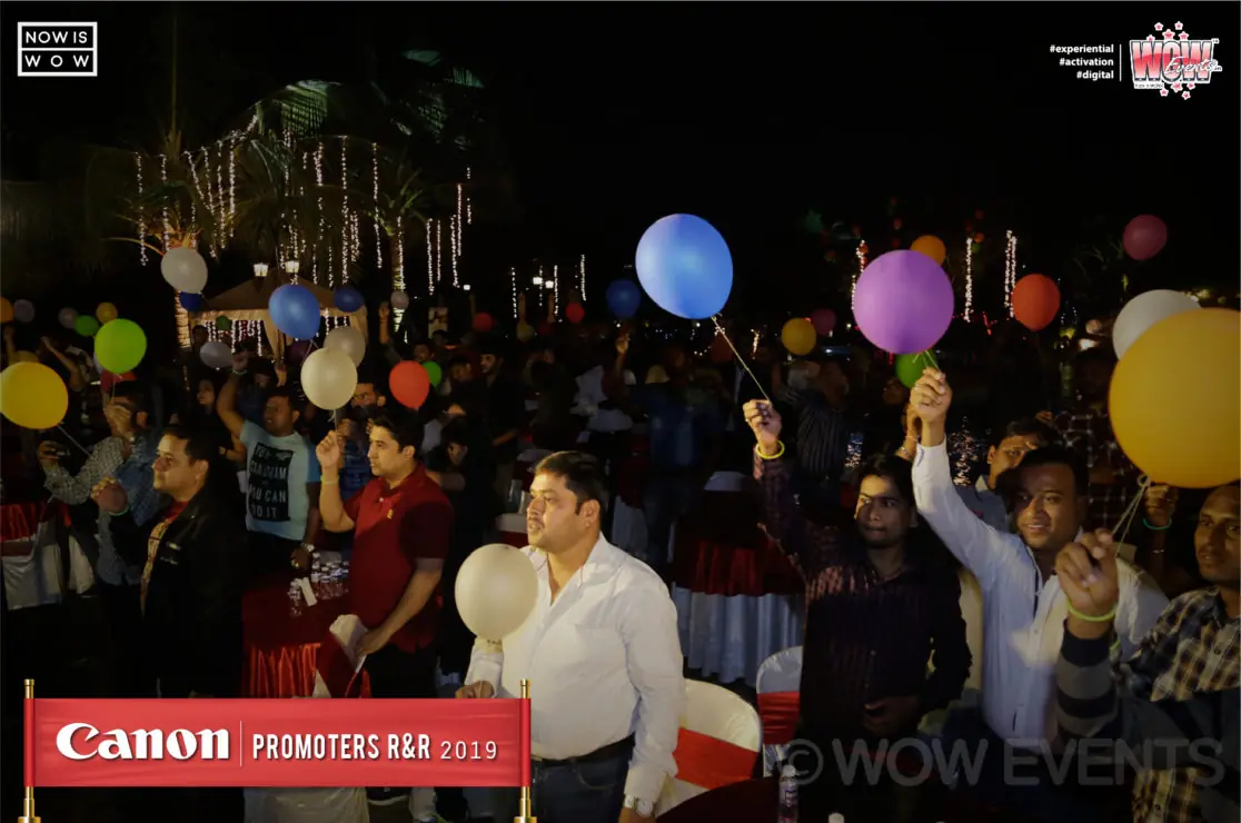 Canon promoters dancing with balloons at the party