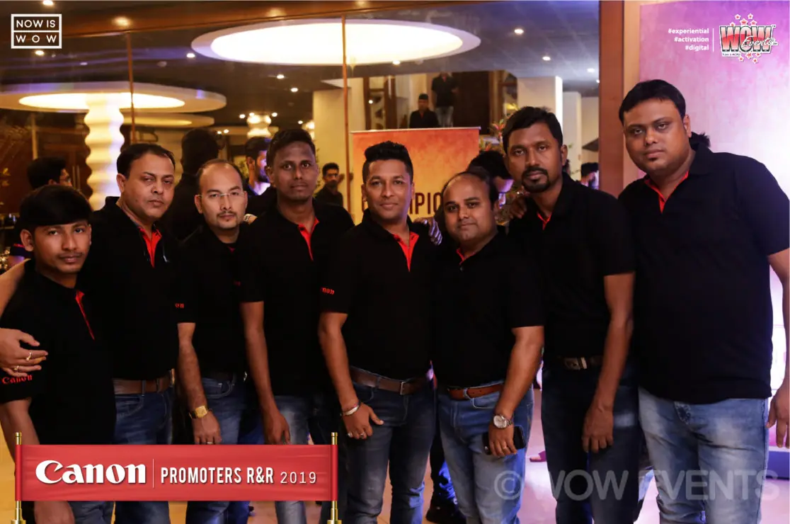 Canon team in black shirts group photo