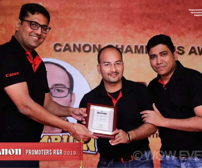 Canon promoters rewards event, award handed to a promoter