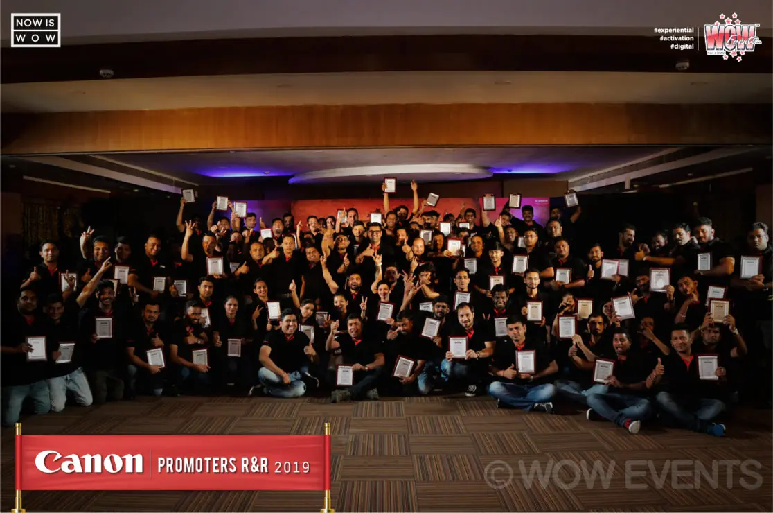 Canon promoters group photo in a hall