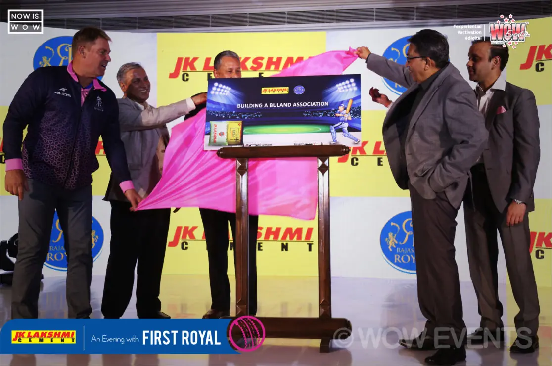 Shane Warne with JK Lakshmi Cement executives at an unveiling