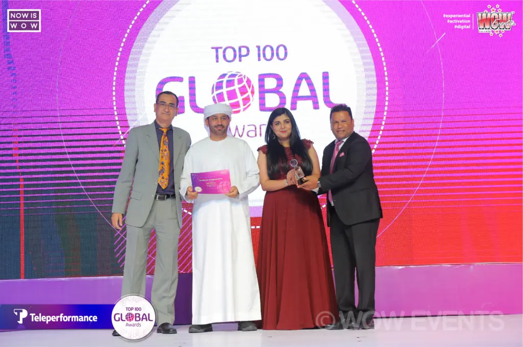 Award winners on stage at the Top 100 Global Awards