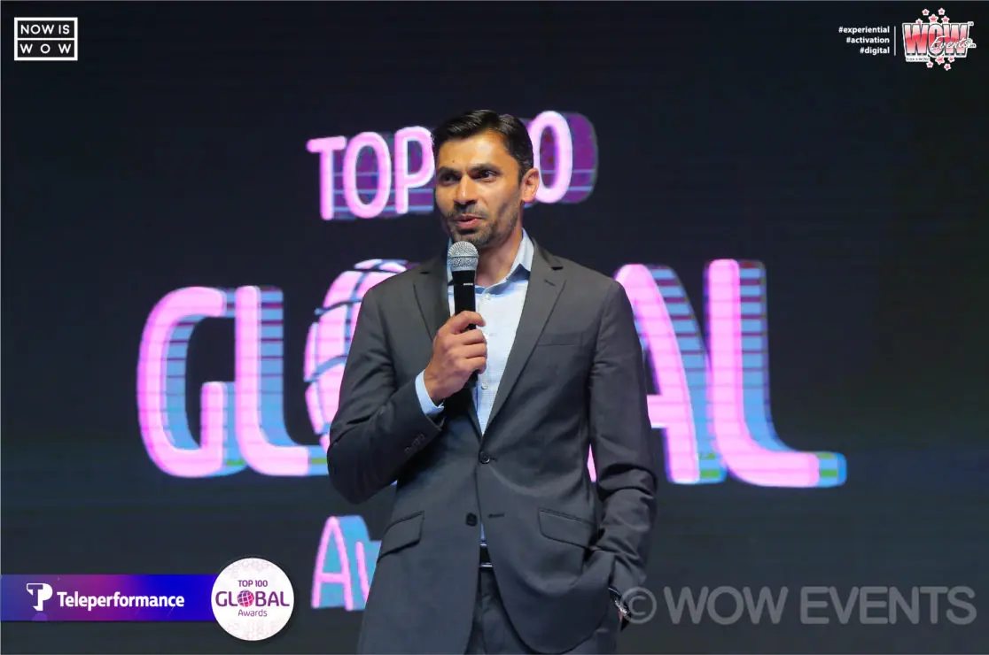 Speaker on the Teleperformance Top 100 Global Awards stage