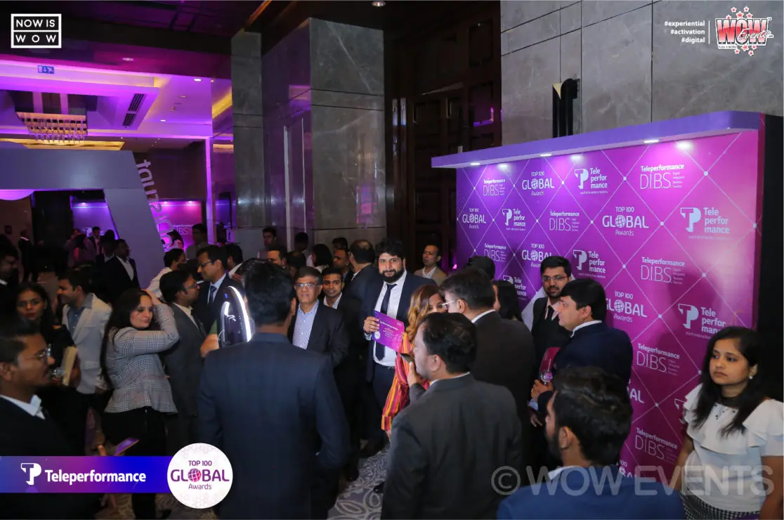 Guests at the Top 100 Global photo wall