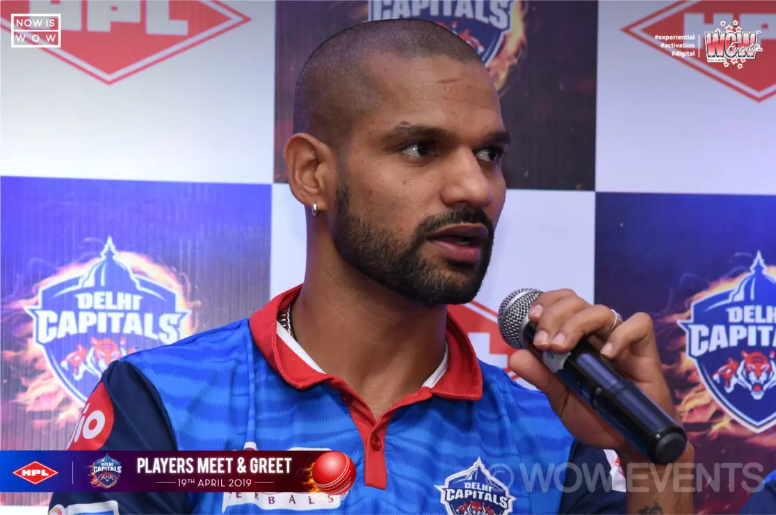 Delhi Capitals player speaking with a microphone
