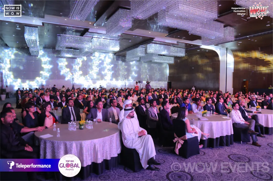 Guests seated at tables at the Teleperformance awards