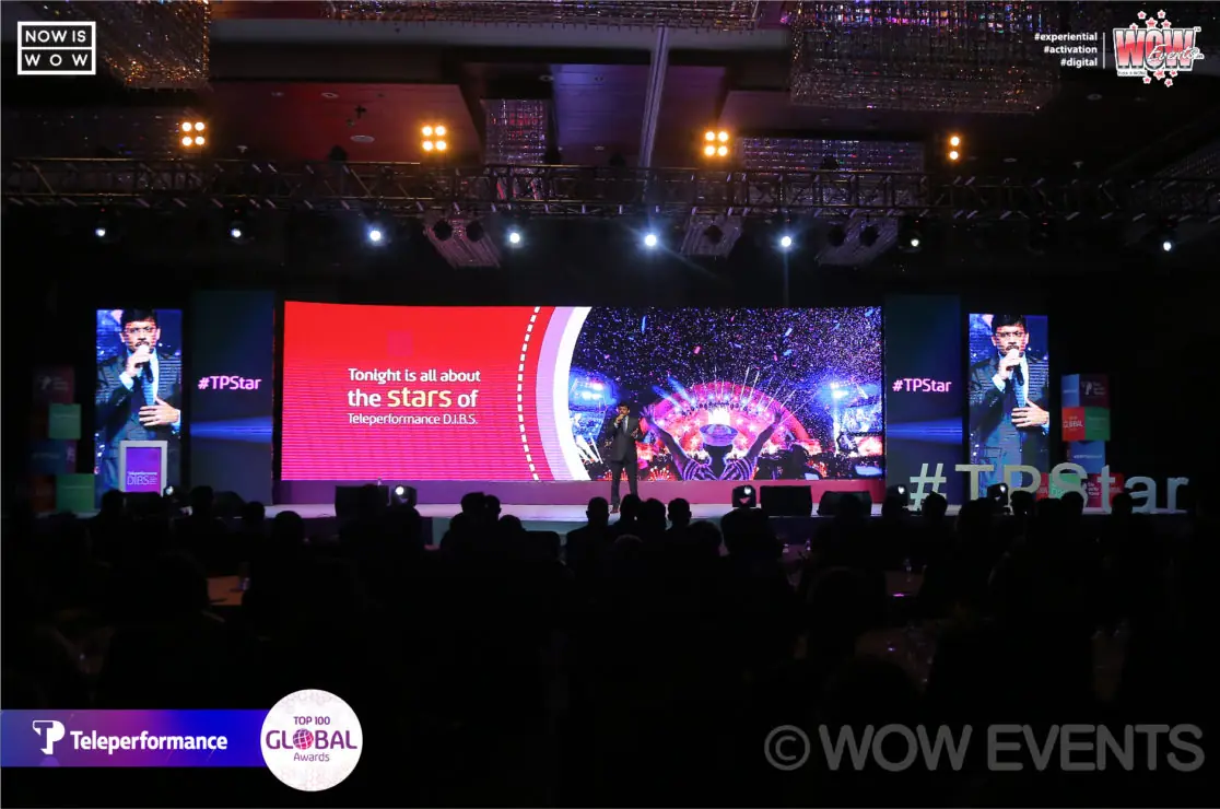 Teleperformance awards stage with red lighting