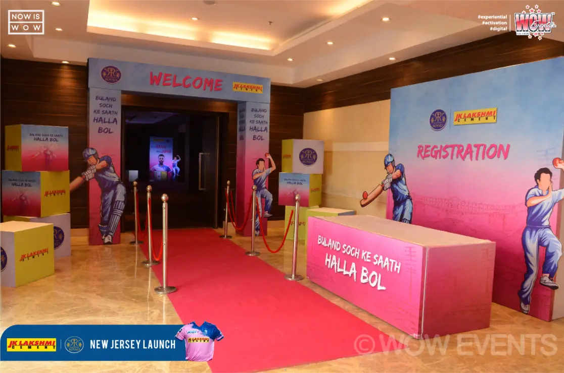 Red carpet entrance with a pink display