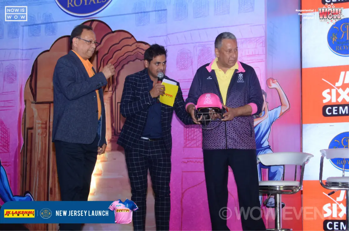 JK Lakshmi Cement executives with players on stage