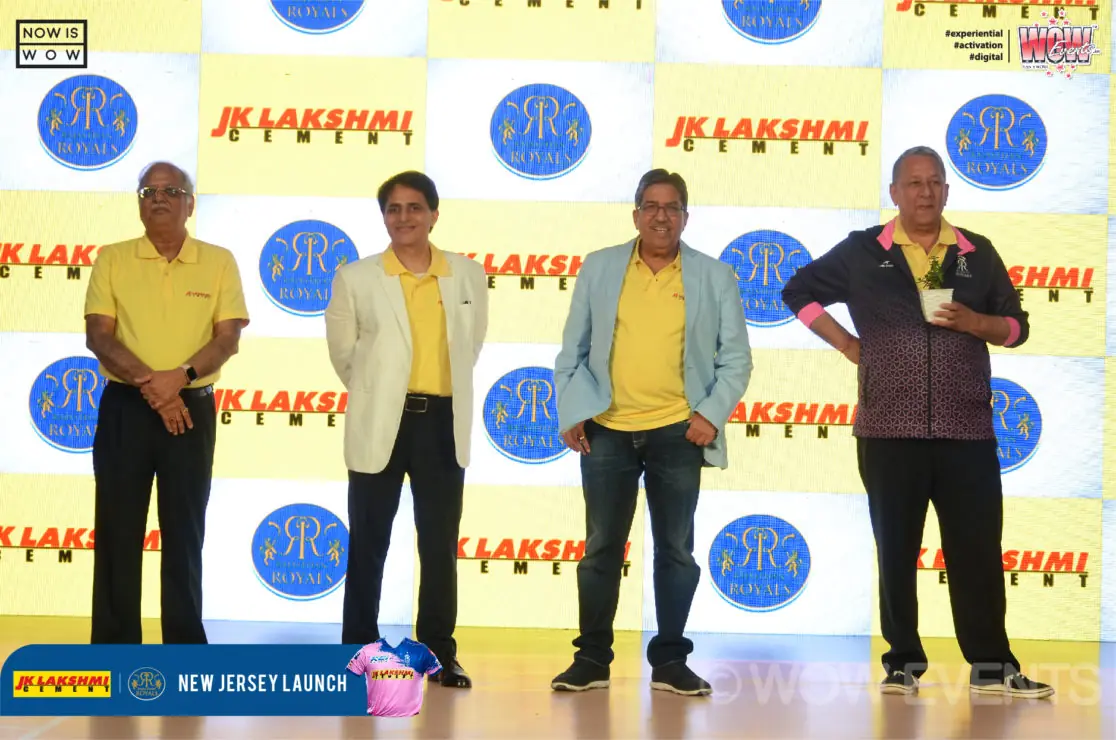 JK Lakshmi Cement executives posing on stage