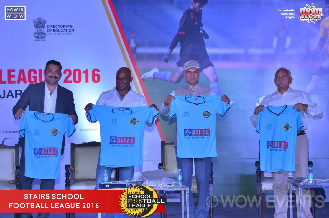 Guests unveiling team jerseys on stage