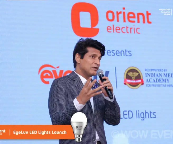 Speaker with a microphone at the Orient Electric Eyeluv LED launch