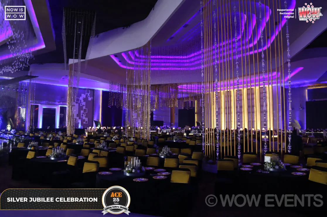 Banquet hall with purple light curtains at the ACE silver jubilee