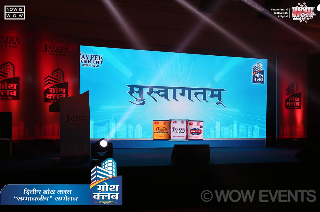 Jaypee Cement stage with a red-lit screen