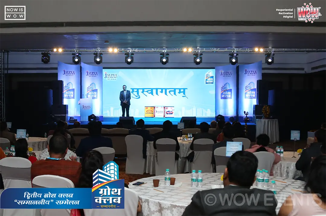 Hall with round tables facing the Jaypee Cement stage