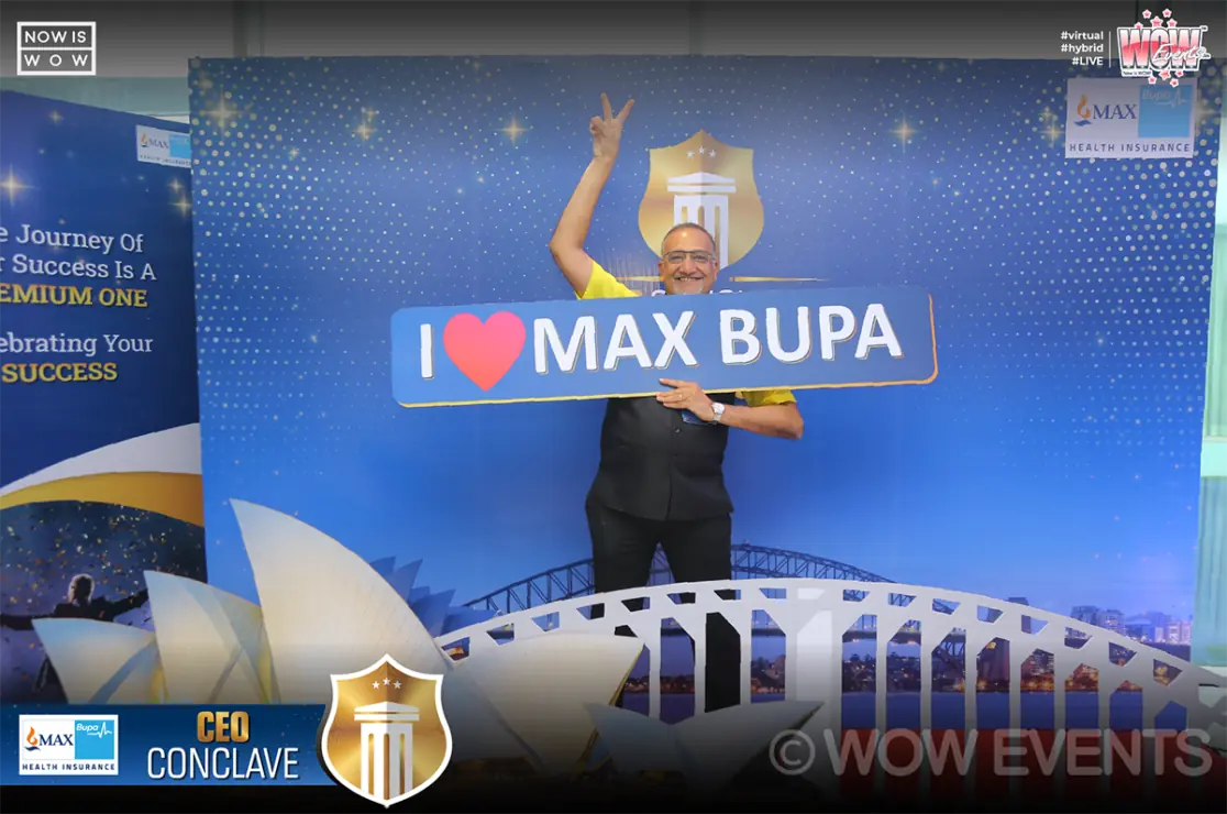 Speaker under an I Love Max Bupa screen