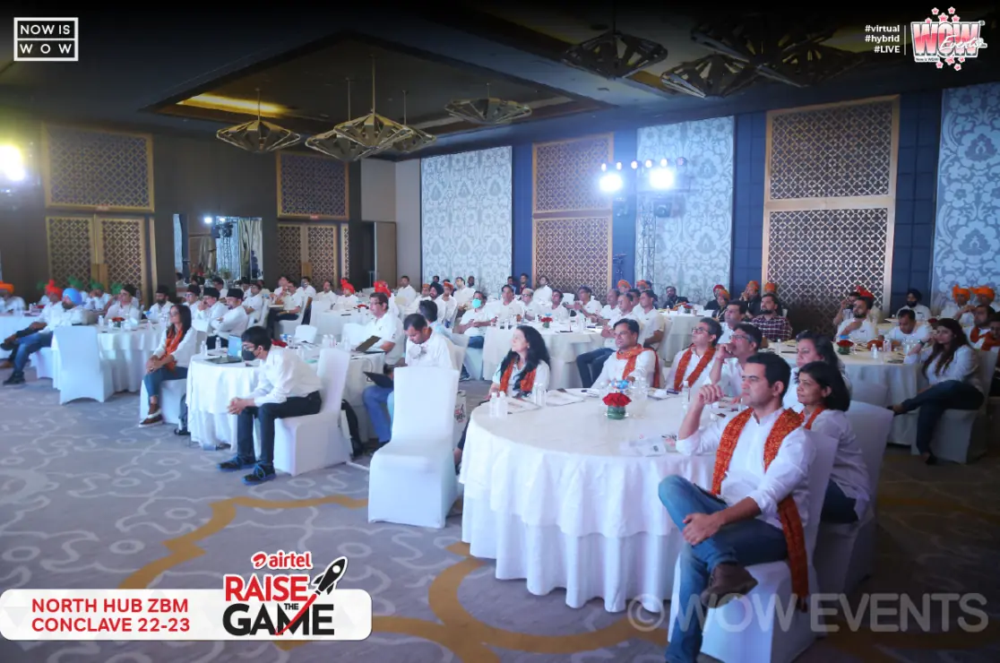 Banquet hall with white tables at the Airtel ZBM conclave 2022