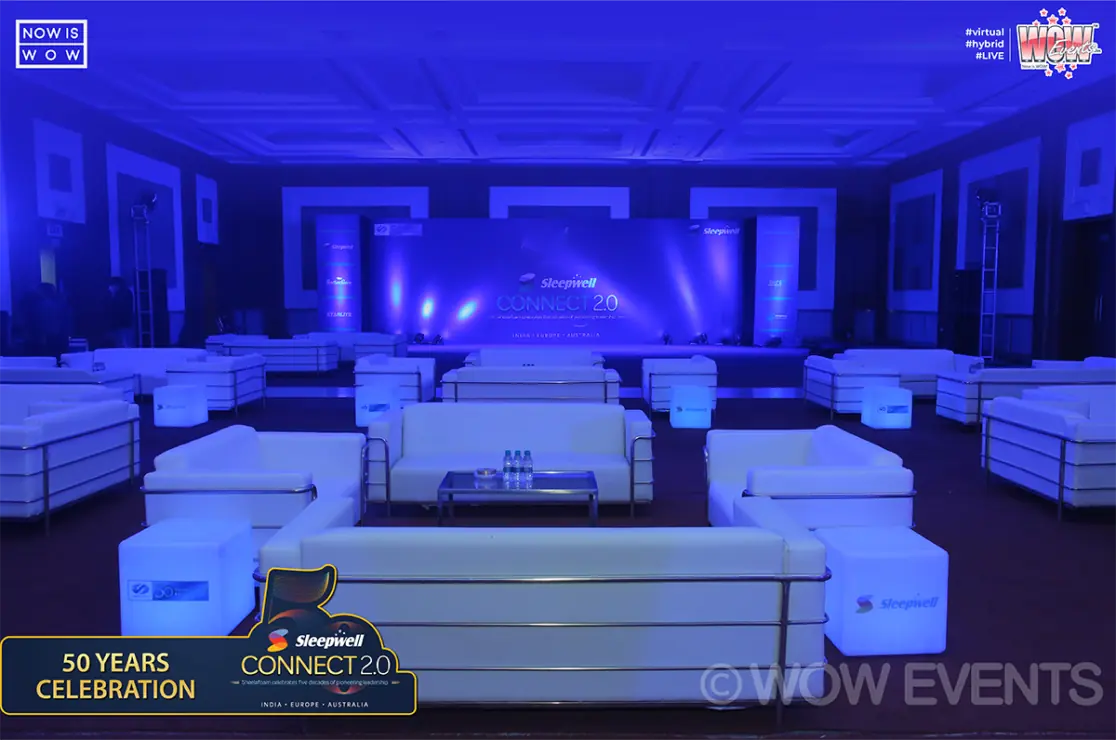 Lounge seating lit in blue at the Sleepwell business meet