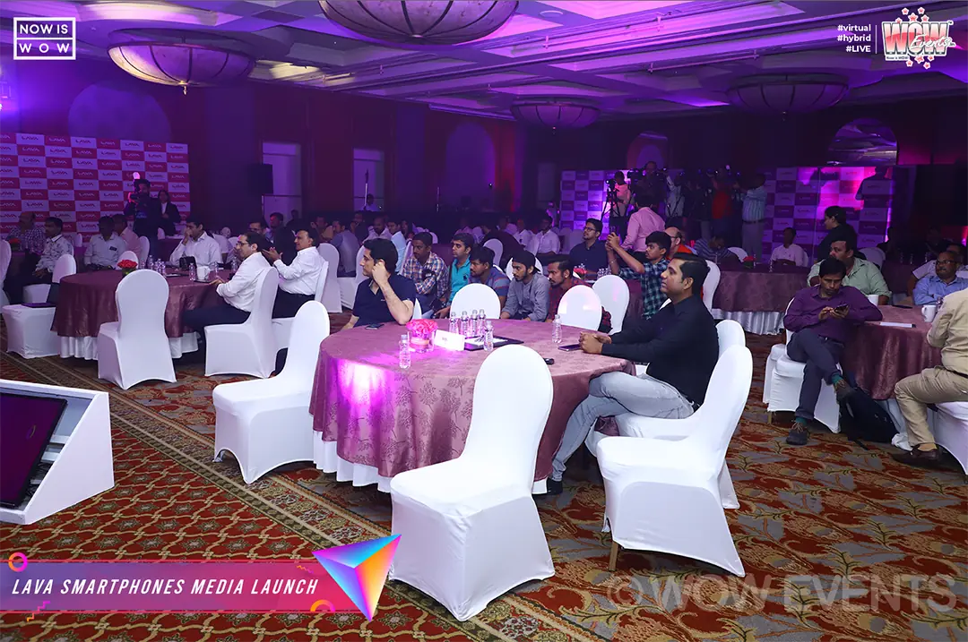 Guests at tables during the Lava Smartphones media launch