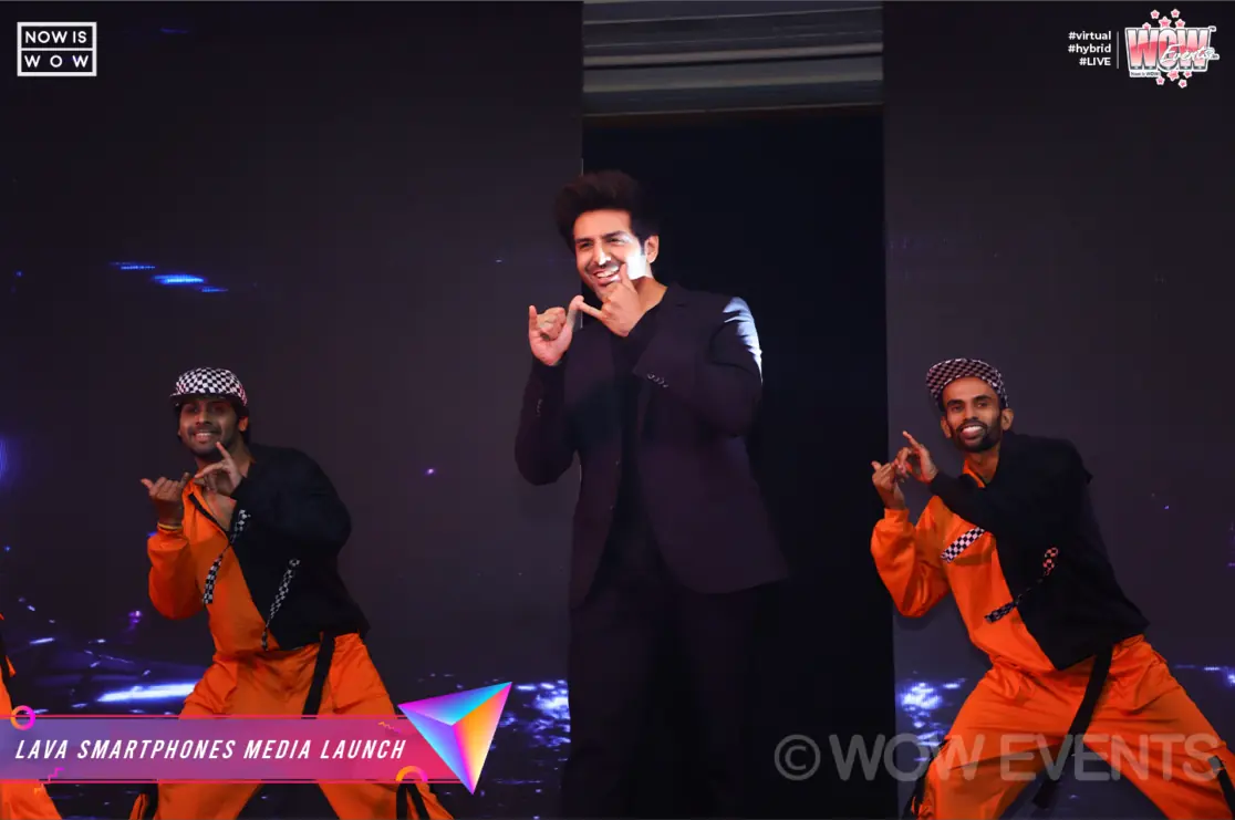 Kartik Aaryan performing with dancers at the Lava launch