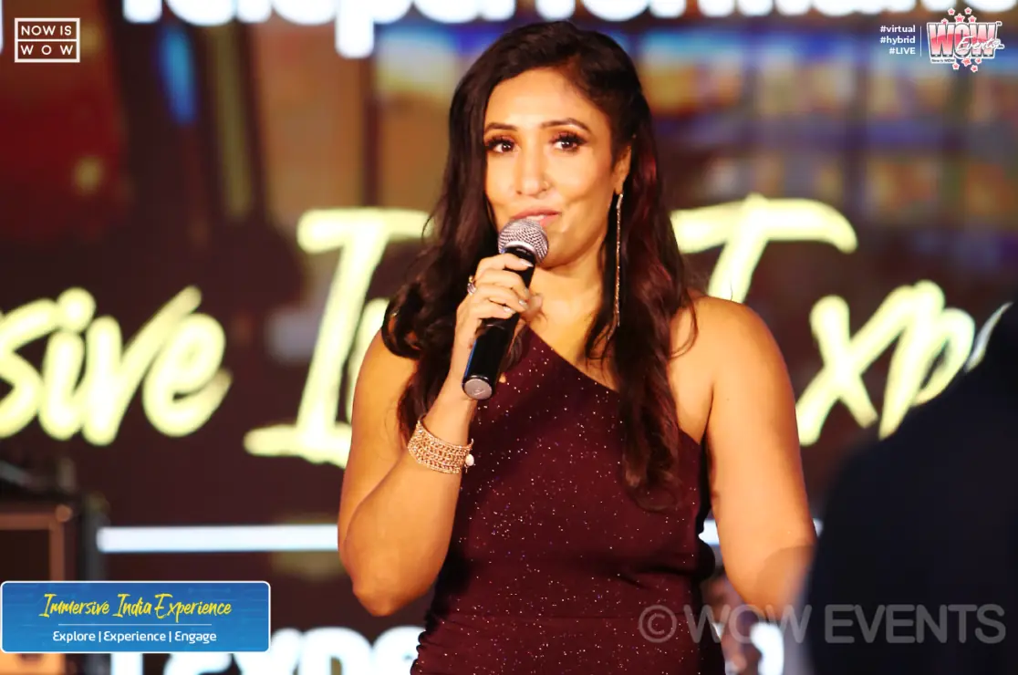 Host speaking at the Teleperformance Immersive India Experience