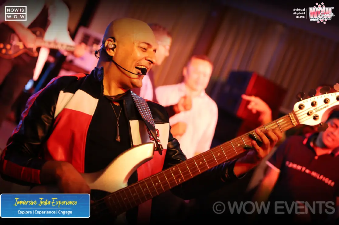 Bassist performing on stage at the Teleperformance event