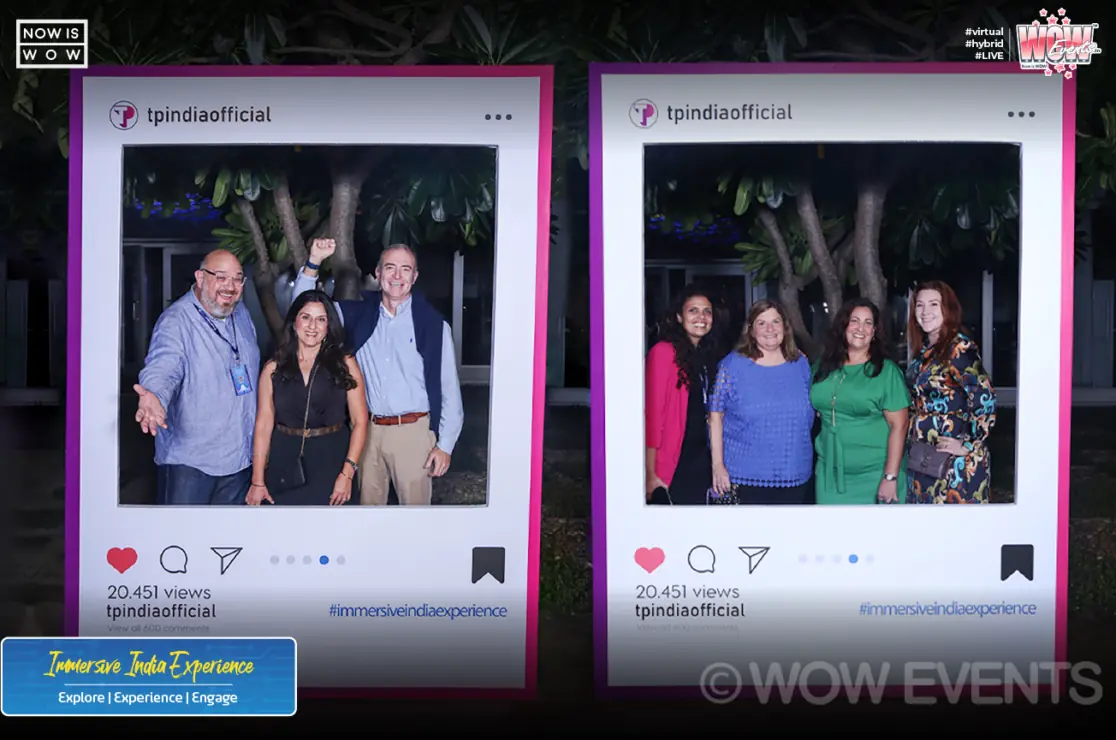 Guests posing in social media photo frames