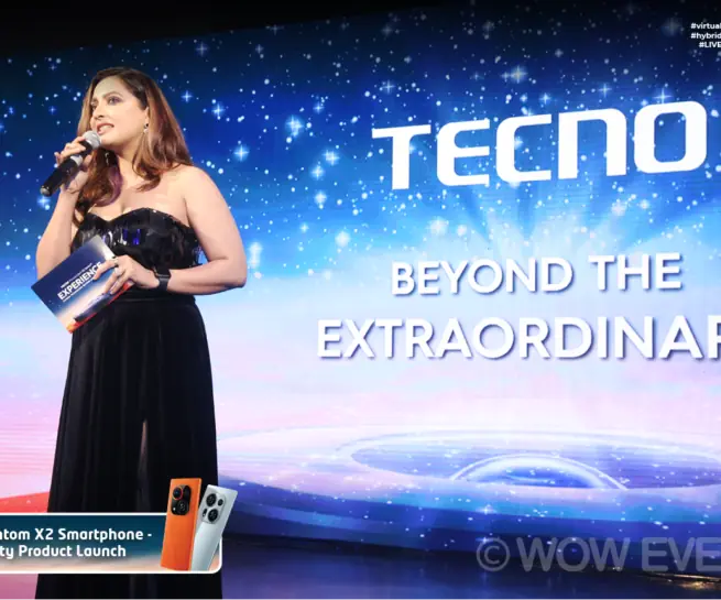 Tecno Phantom X2 launch, host on stage with Tecno screen