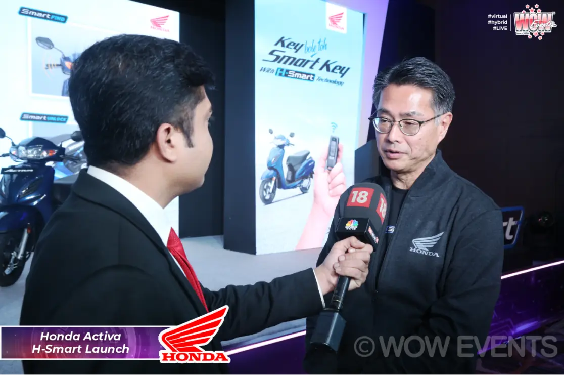 Honda executive interviewed by the media at the H-Smart launch