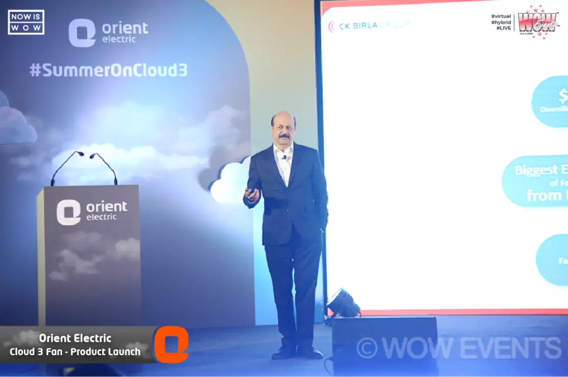 Presenter on stage at the Orient Electric Cloud 3 fan launch