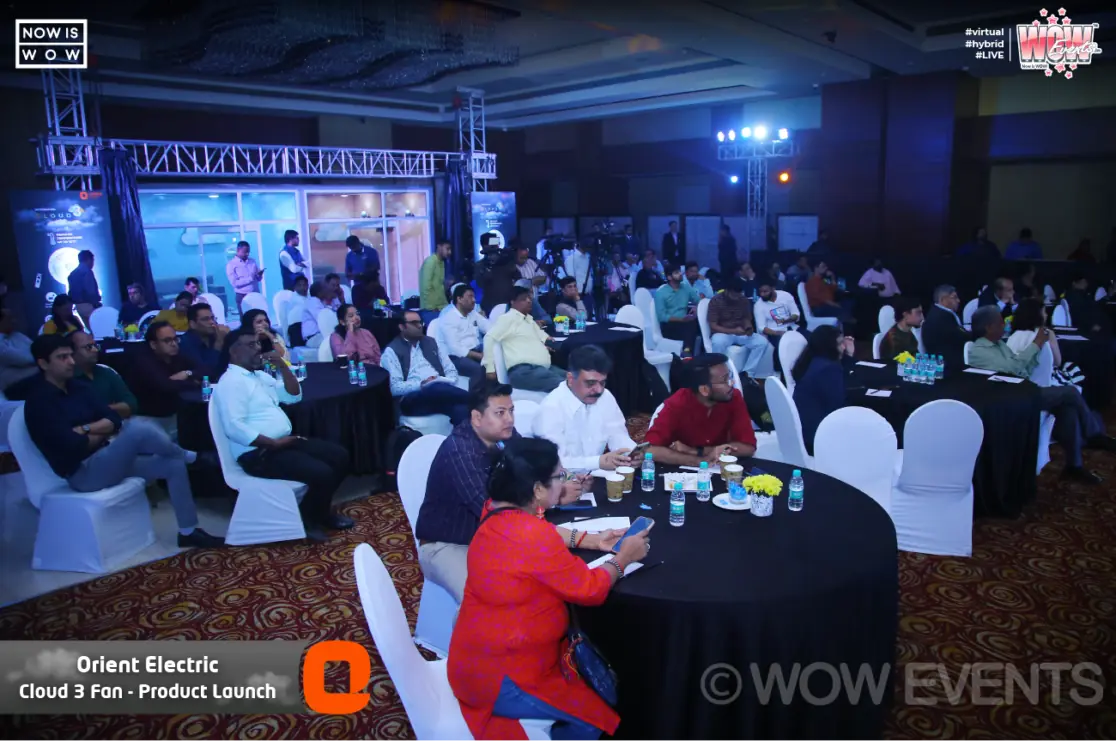 Guests at round tables at the Orient Electric Cloud 3 launch
