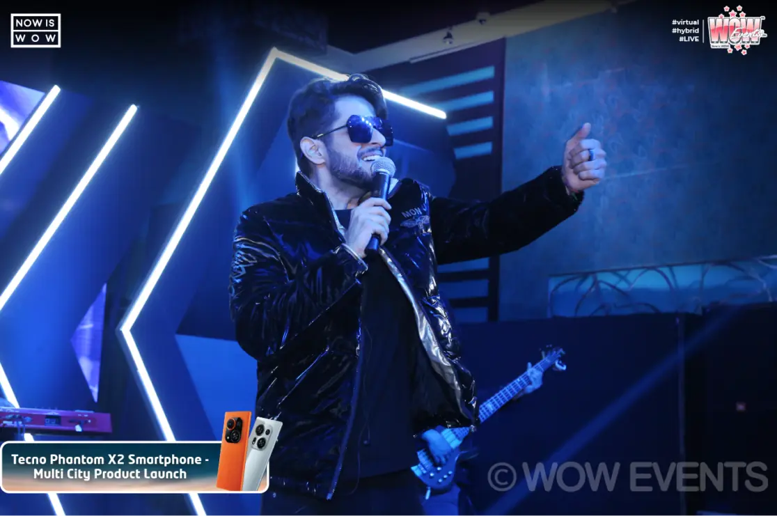 Rock performer with a guitar at the Tecno Phantom X2 launch