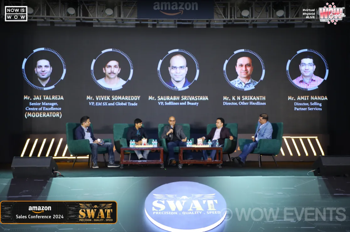 Five panellists seated on the Amazon Sales Conference stage