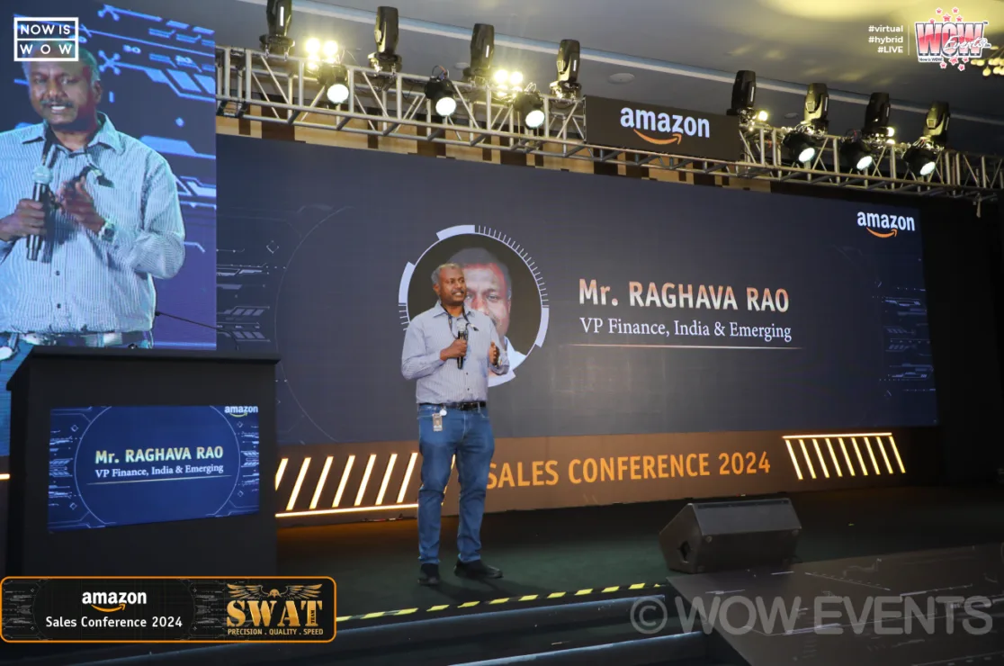 Amazon VP speaking on the Sales Conference 2024 stage