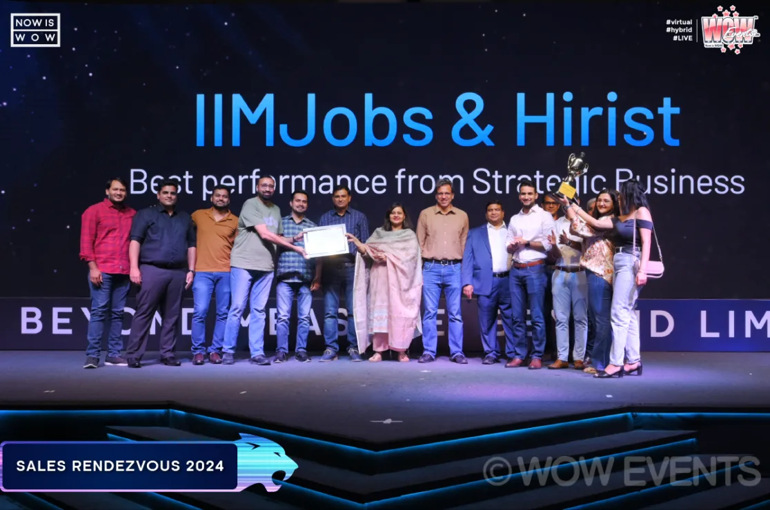 IIMJobs and Hirist team receiving a best performance award