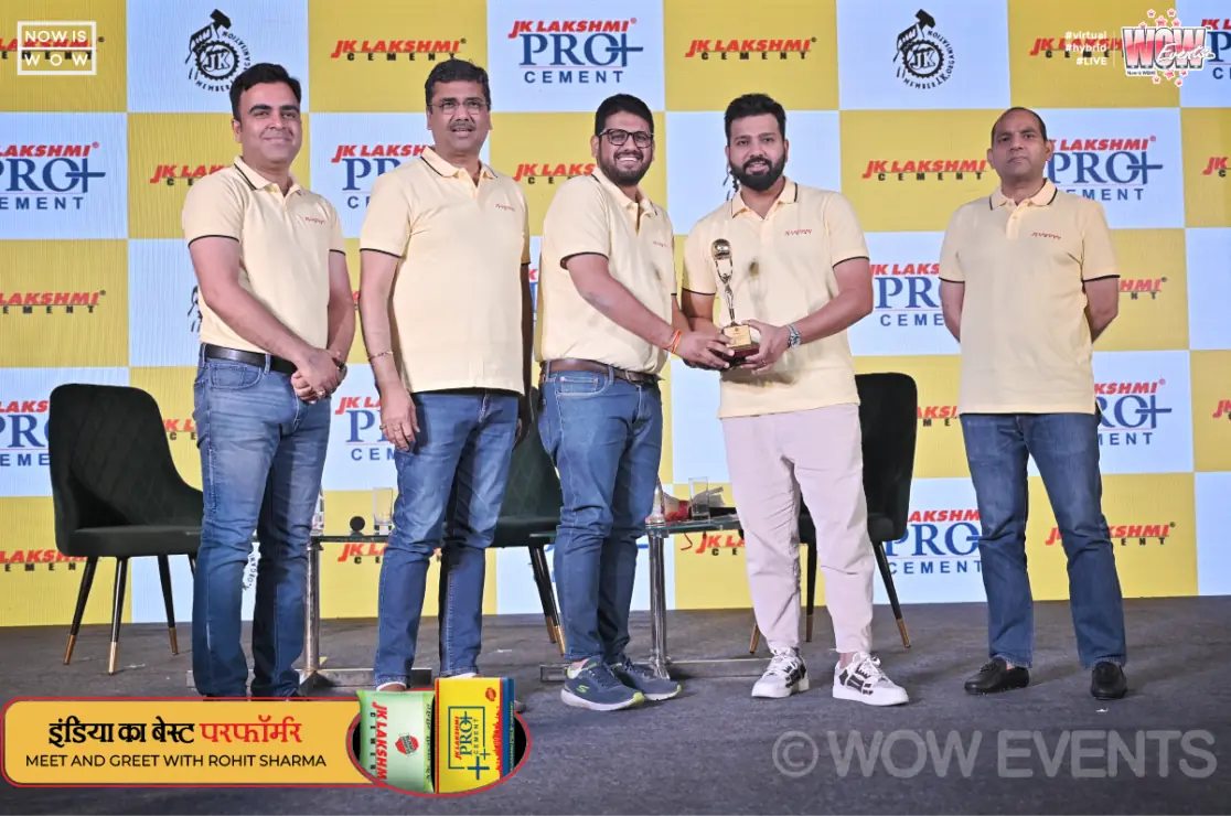 Rohit Sharma with the JK Lakshmi Cement team on stage