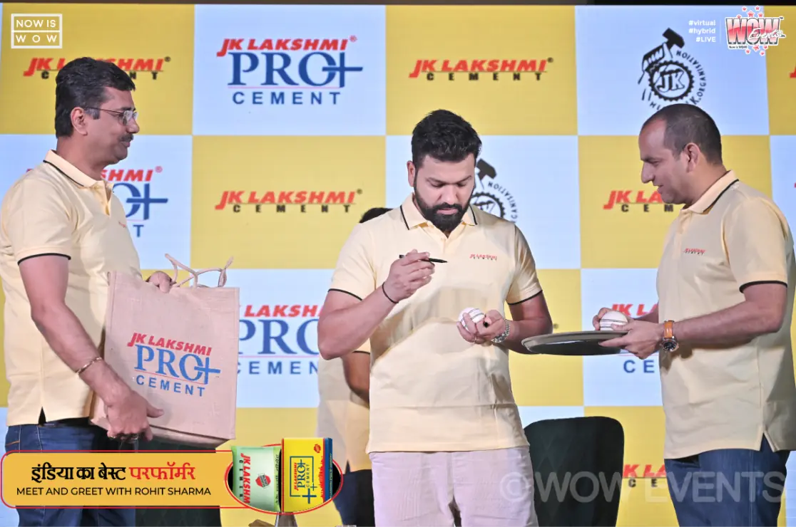 Rohit Sharma receiving a JK Lakshmi Pro+ Cement gift box