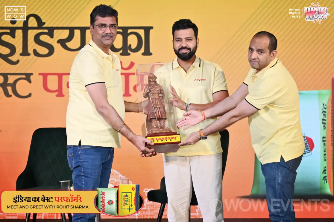 Rohit Sharma receiving a memento at the JK Lakshmi Cement meet and greet
