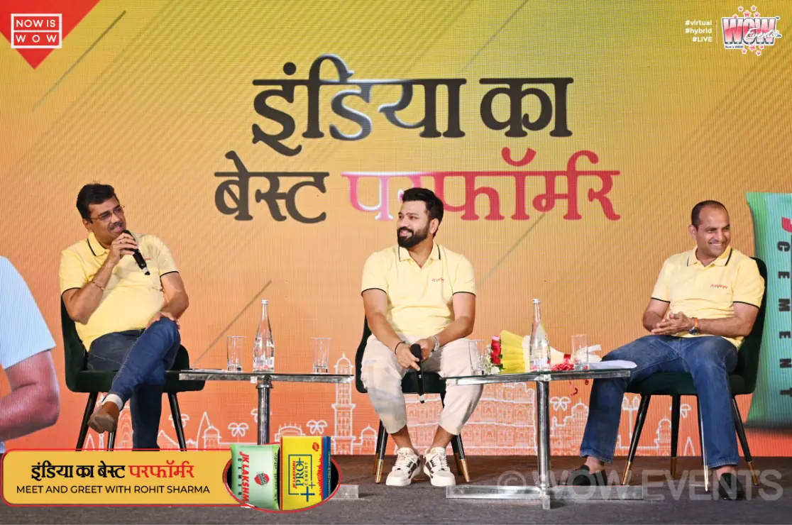 Rohit Sharma seated on stage at JK Lakshmi Cement meet and greet